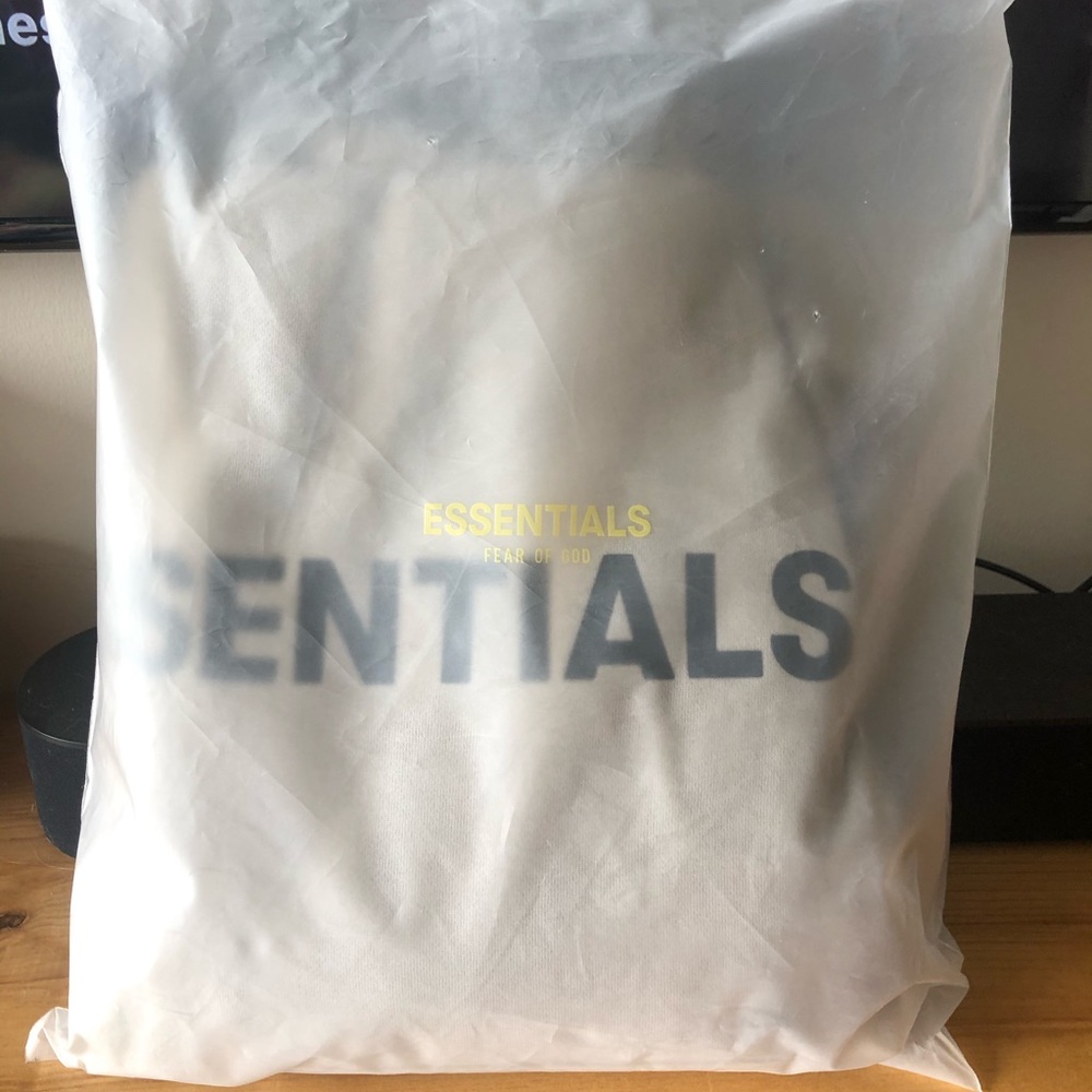 fear of god essentials moss hoodie